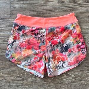 Athleta Girl Girls Run the World Shorts Orange Floral Print Kids Size XL/14